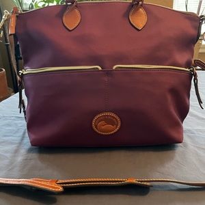 Dooney & Bourke Canvas Tote. Adjustable strap that can be removed. Burgundy.